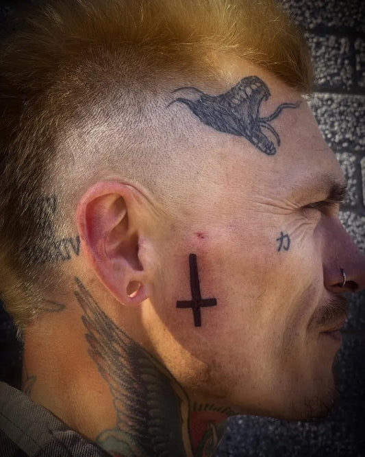 Big Blackwork Snake Cross Wings on Men Face Tattoo by @jayz_inkk