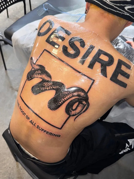 Big Blackwork Snake and Text on Men Back Tattoo by @zerokid_tattoo