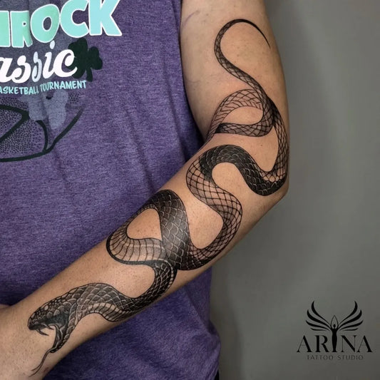 Big Blackwork Snake on Men Arm Tattoo by @arina_tattoostudio