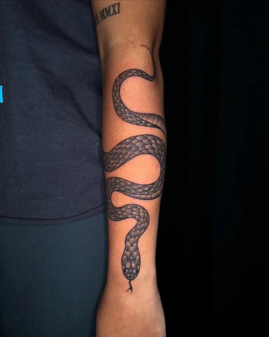 Big Blackwork Snake on Men Arm Tattoo by @bella.tattoos.570
