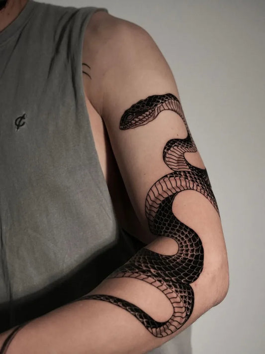 Big Blackwork Snake on Men Arm Tattoo by @bidotattoo
