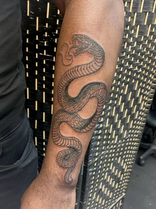 Big Blackwork Snake on Men Arm Tattoo by @liloatstattoo