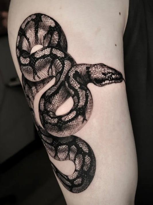 Big Blackwork Snake on Men Arm Tattoo by @orot_tattoo