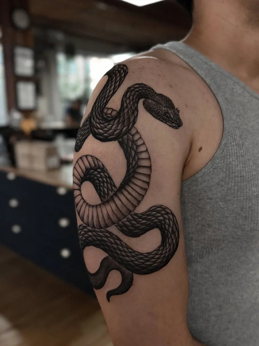 Big Blackwork Snake on Men Arm Tattoo by @vic.ink_
