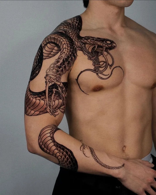 Big Blackwork Snake on Men Shoulder Tattoo by @blackwhiteinkart