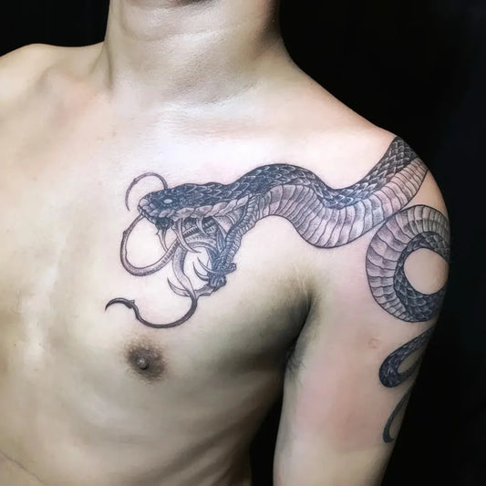 Big Blackwork Snake on Men Shoulder Tattoo by @godline.tattoo