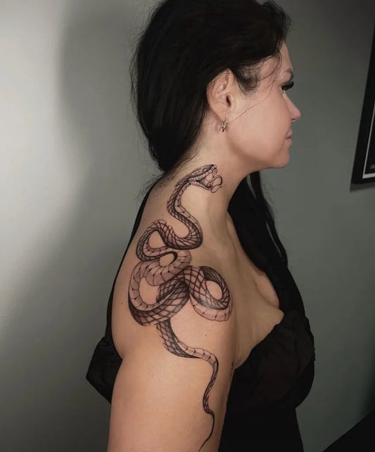 Big Blackwork Snake on Women Shoulder Tattoo by @furu_ink_studio