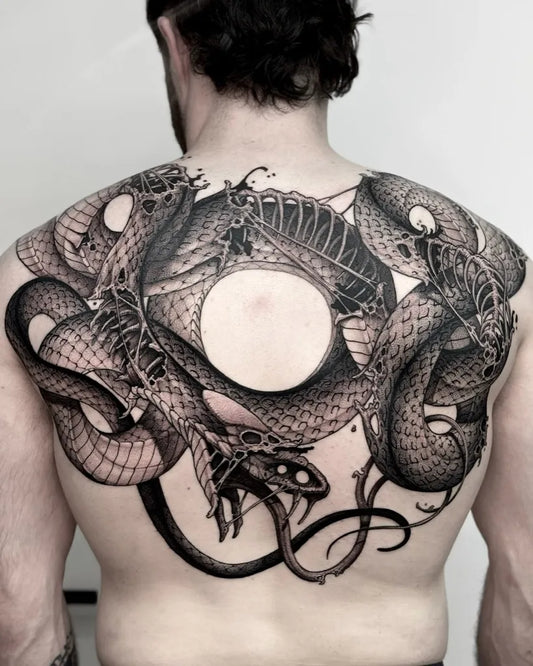 Big Blackwork Snakes on Men Back Tattoo by @labeltattoo