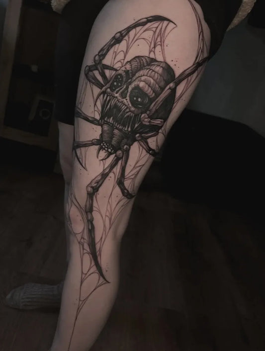 Big Blackwork Spider Skull and Web on Women Thigh Tattoo by @sledziu_tattoo