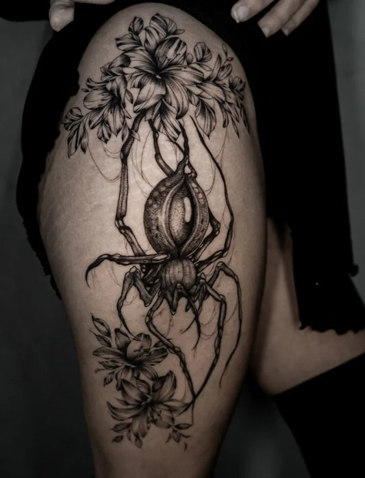 Big Blackwork Spider with Flowers on Women Thigh Tattoo by @morgueart_