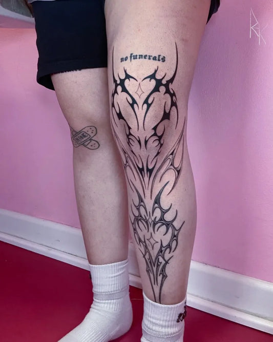 Big Blackwork Spiky Heart Tribal Tattoo on Women Knee by @reyk.curse
