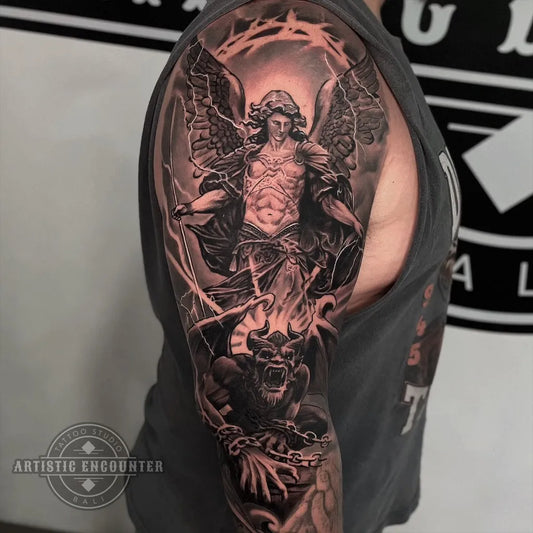 Big Blackwork StMichaelSlayingDragon Tattoo on Men Shoulder by @artisticencountertattoobali