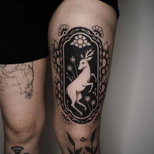 Big Blackwork Stag in Frame on Women Thigh Tattoo by @pauli.tattoo