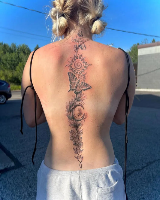 Big Blackwork Sun Moon Butterflies on Women Spine Tattoo by @gitcheegumeetattoo