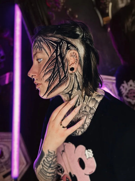 Big Blackwork Tentacle Branches on Women Face Tattoo by @miraparamonova_