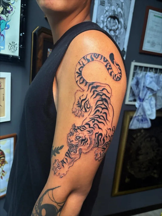 Big Blackwork Tiger Men Arm Tattoo by @baddiecashoutattoo