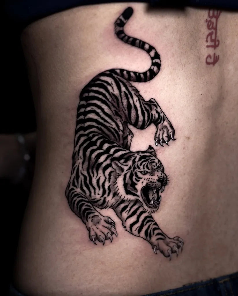 Big Blackwork Tiger with Sanskrit Script on Women Back Tattoo by @pgcosta.ink