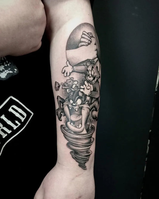 Big Blackwork Tom and Jerry Tornado Cartoon Tattoo on Men Arm by @alicelittle.tattoo