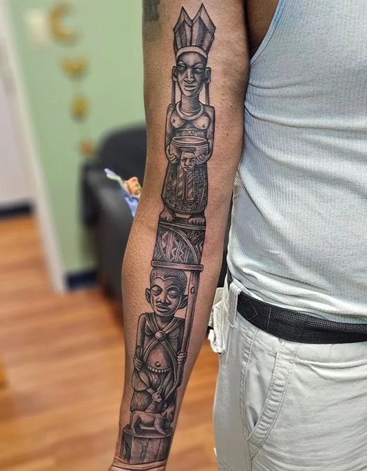 Big Blackwork Totem Pole Spiritual Tattoo on Men Arm by @moonbugtattoos