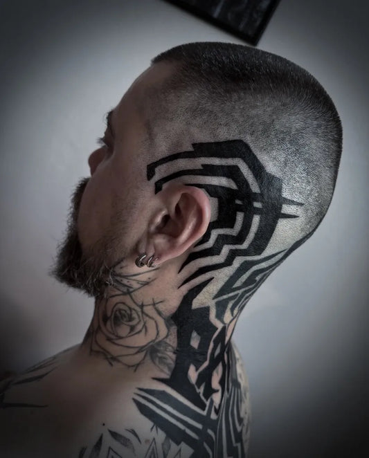 Big Blackwork Tribal Pattern Tattoo on Men Head by @haxan.tattoo