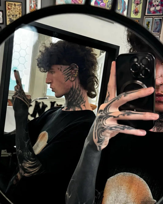 Big Blackwork Tribal lines on Men Face Tattoo by @nicodiansk