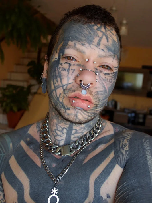 Big Blackwork Tribal on Men Face Tattoo by @nahlu__