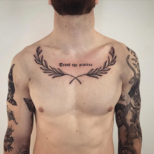 Big Blackwork Trust the Process Laurel on Men Chest Tattoo by @cocoink_tattoo