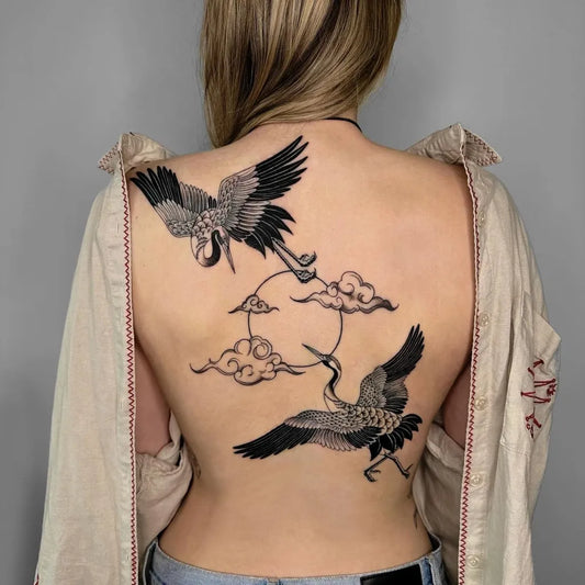 Big Blackwork Two Cranes Cloud Tattoo on Women Back by @maryyy_tattoo