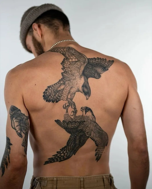 Big Blackwork Two Falcons on Men Back Tattoo by @theartoftattooingofficial