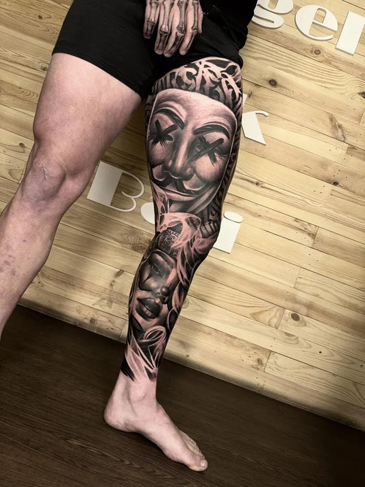 Big Blackwork Venice Mask and Flowers on Men Leg Tattoo by @kong.angelink