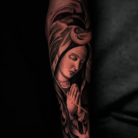 Big Blackwork Virgin Mary praying on Men Arm Religious Tattoo by @ortiz.tattoos