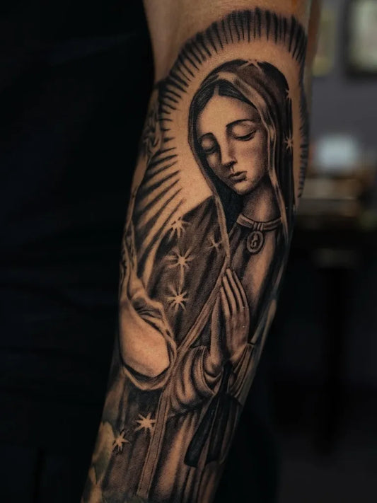 Big Blackwork Virgin of Guadalupe on Men Arm Religious Tattoo by @jeyssontatz