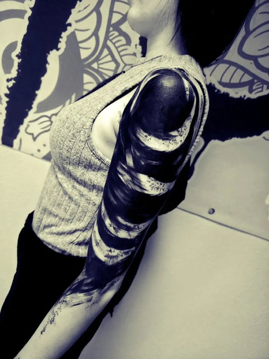 Big Blackwork Waves Arm Tattoo on Women by @heiko108tattoo