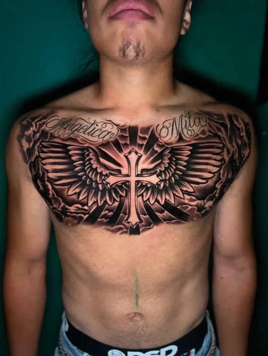 Big Blackwork Winged Cross on Men Chest Tattoo by @tat2s_benjy0106