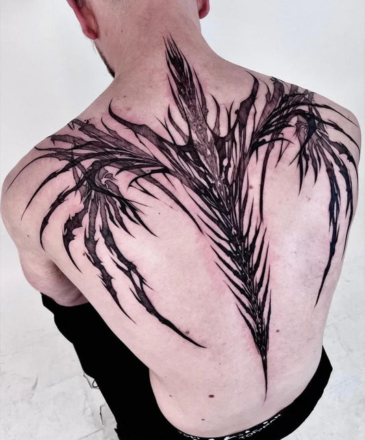 Big Blackwork Winged Spines on Men Back Tattoo by @inflo.ink
