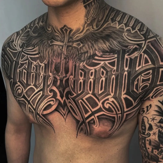 Big Blackwork Wings and Cross on Men Chest Tattoo by @dopeletterstattoo