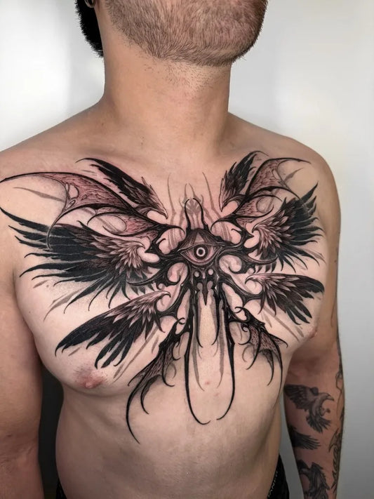 Big Blackwork Wings and Eye on Men Chest Tattoo by @jff.ttt