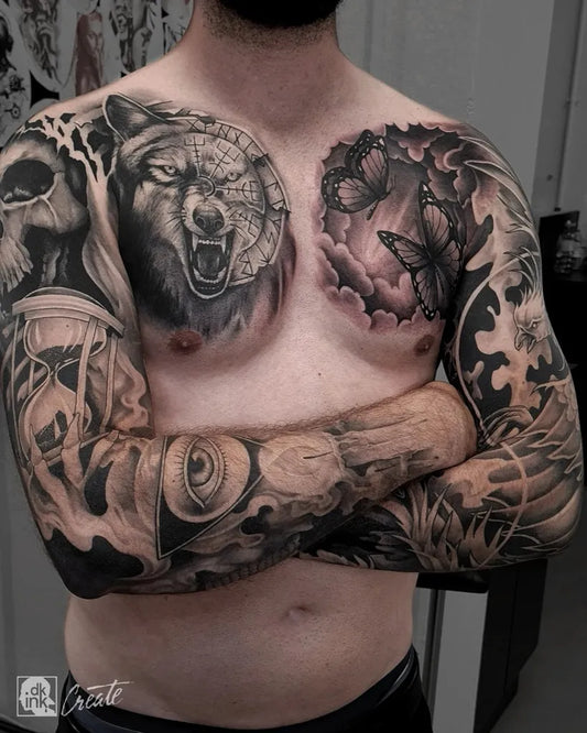 Big Blackwork Wolf Butterfly Skull on Men Chest Tattoo by @daniel.kober.tattoo