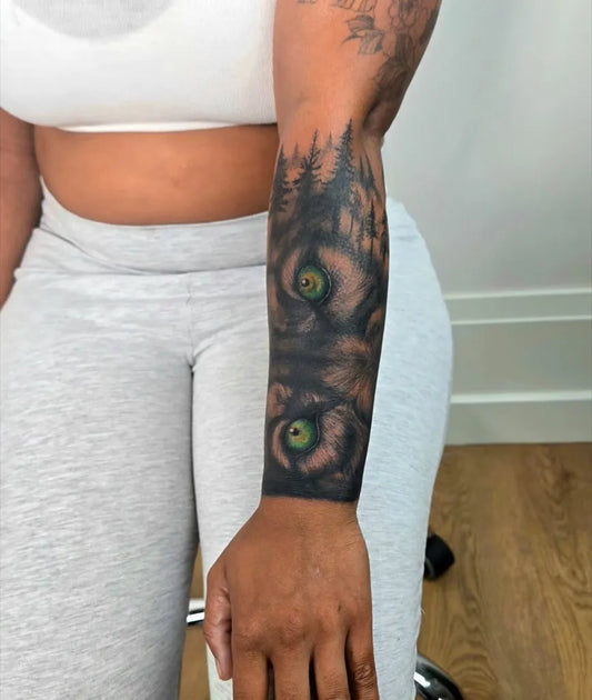 Big Blackwork Wolf Eyes on Women Arm Tattoo by @legalpics