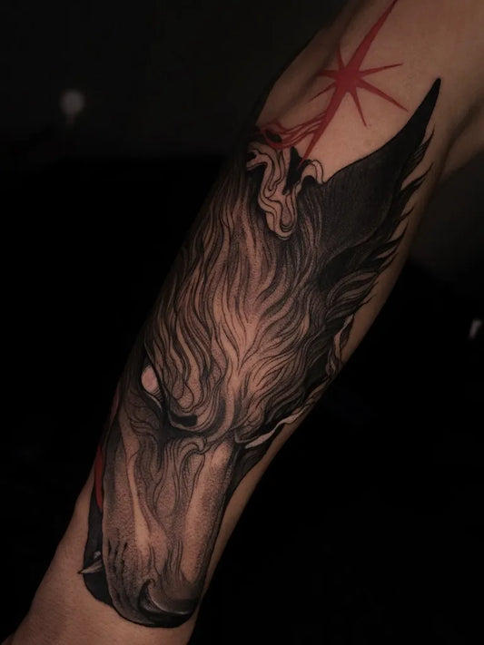 Big Blackwork Wolf with Wings on Men Arm Tattoo by @iness.tattoo