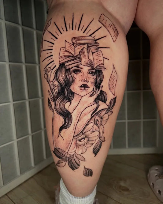 Big Blackwork Woman with Sun and Flowers Tattoo on Women Calf by @roogladwelltattoos