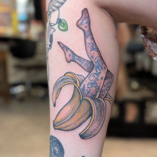 Big Blue Banana with Legs Tattoo on Women Arm by @tatiyanawalter