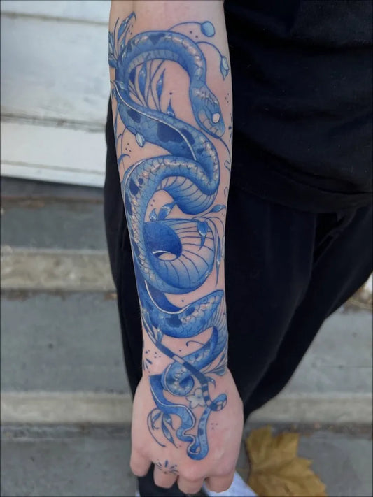 Big Blue Dragon Tattoo on Men Arm by @boonzietattoo