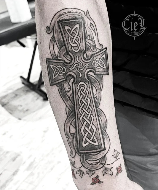 Big Celtic Celtic Cross with Knotwork and Dragon Tattoo on Men Arm by @ciel.tattoos