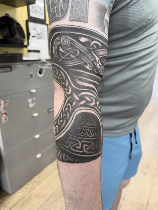 Big Celtic Knotwork Dragon Tattoo on Men Arm by @philcollison
