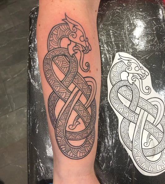 Big Celtic Knotwork Dragon Tattoo on Men Arm by @tattoos_by_markula
