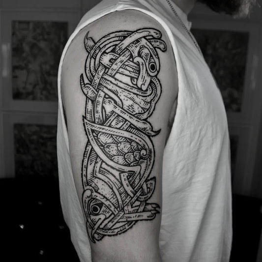 Big Celtic Knotwork Fish Tattoo on Men Upper Arm by @joe__murphy__tattoo
