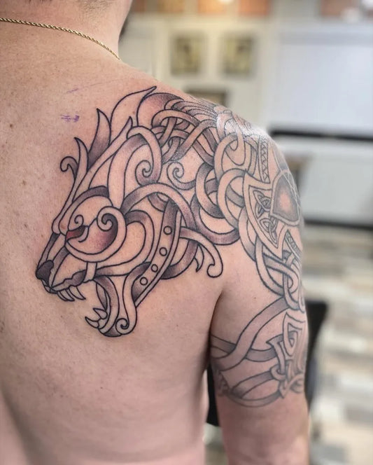 Big Celtic Lion Tattoo on Men Shoulder by @jackie_sue_tattoo