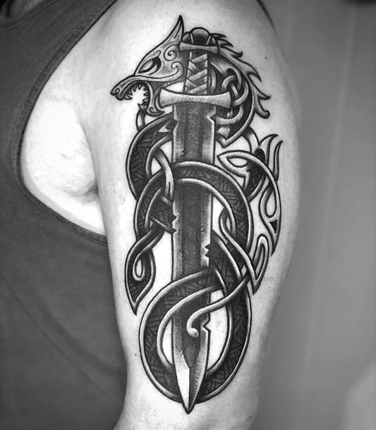 Big Celtic Wolf Sword Snake Tattoo on Men Shoulder by @lotustattoostudio
