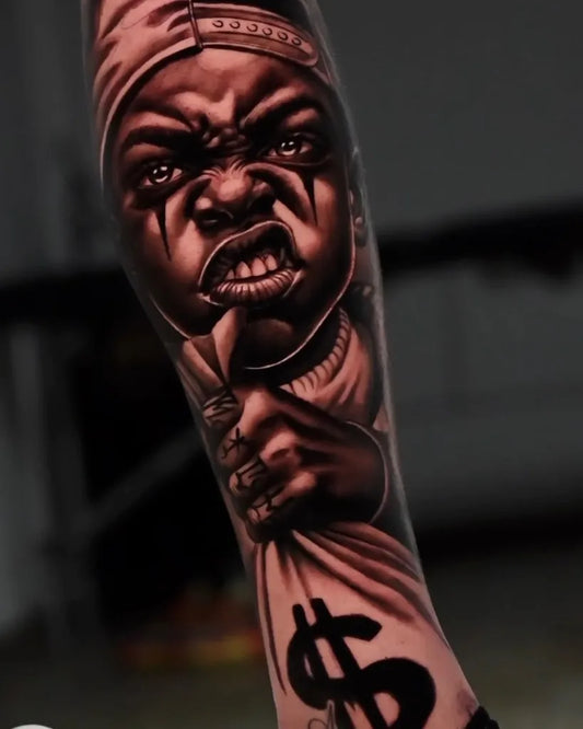 Big Chicano Angry Chicano Child Holding Money Bag and Dollar Signs Tattoo on Men Arm by @guglielman_tattooer
